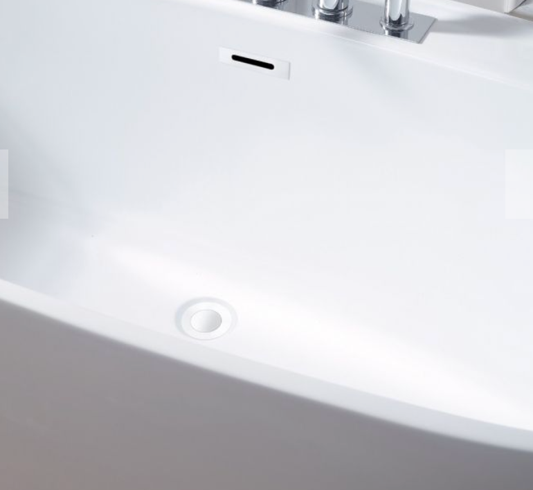 Evos Boutiques 60 in freestanding tub and mounting faucet close up