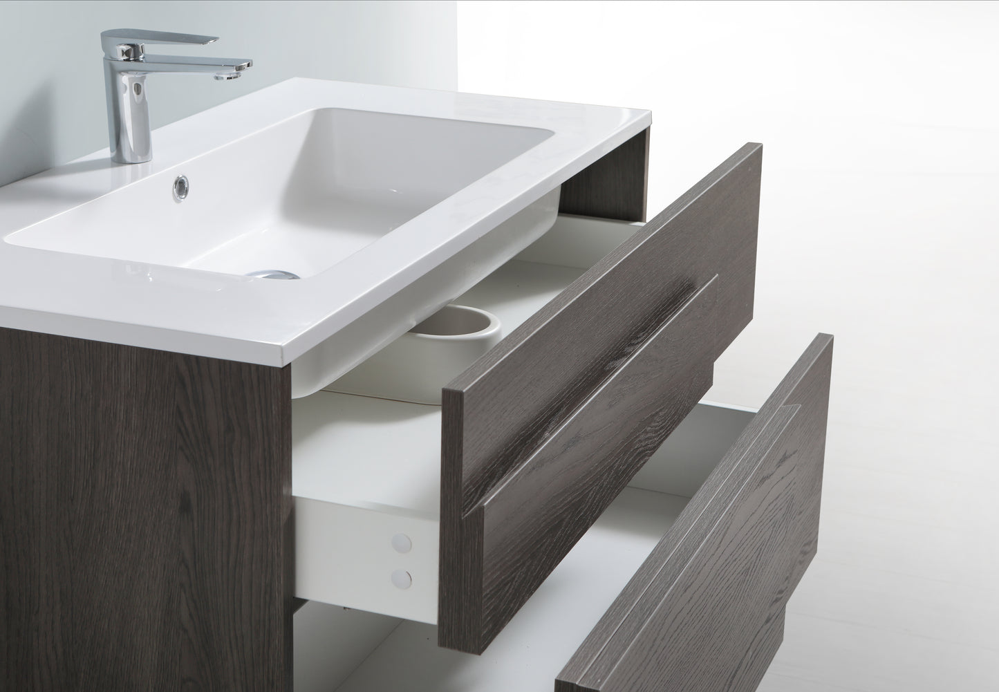 Evos Boutiques 40 in glossy white polymarble countertop in wall-mounted white vanity looking down doors open
